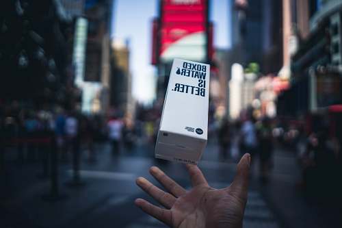 times square Boxes Water is Better floating on mid air taken at daytime new york